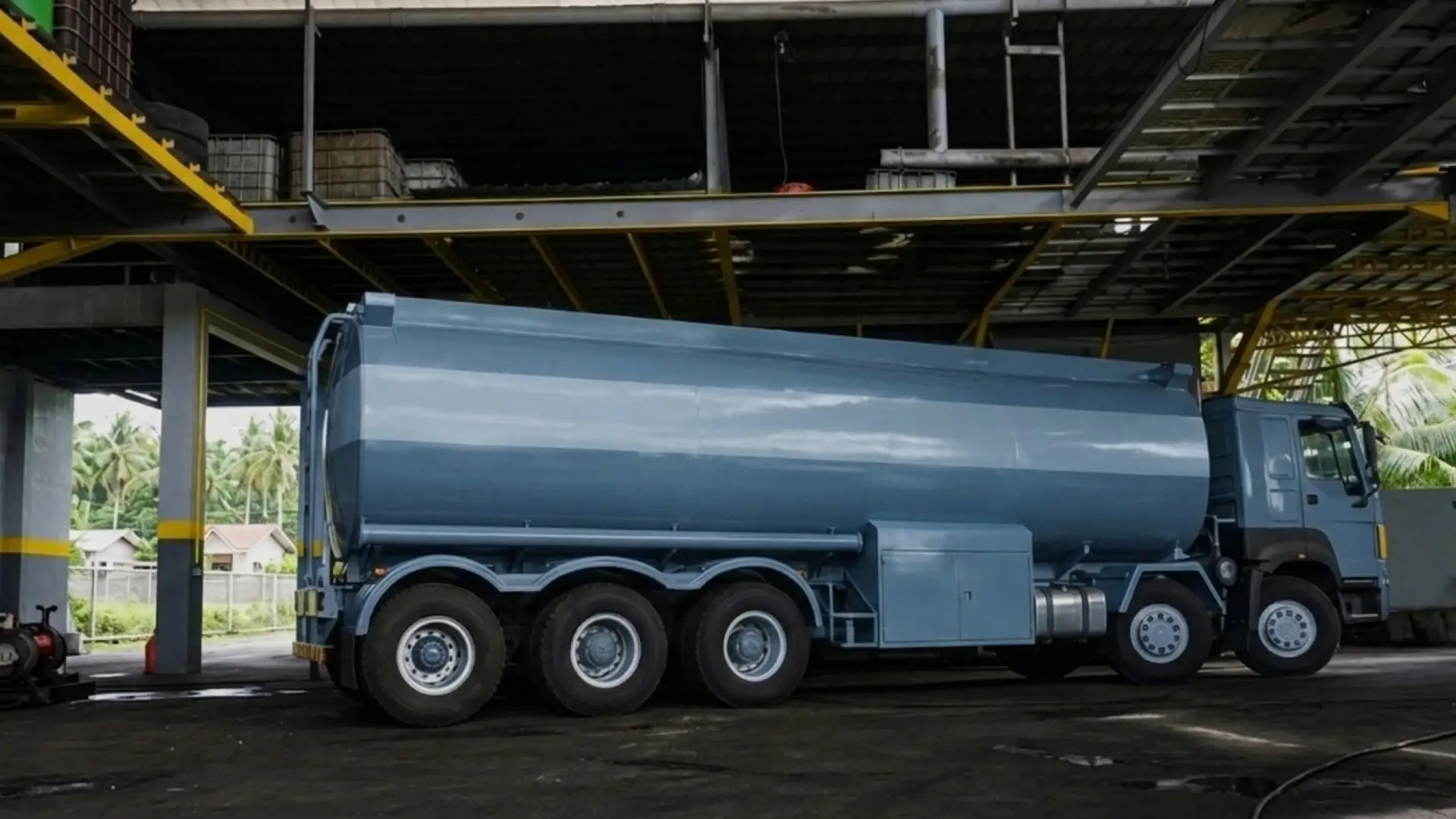 Industrial vacuum tanker truck or waste pumping vehicle for factory waset management. The side profile shows the large storage tank and specialized equipment compartments used for STP cleaning and large-scale waste hauling located in Dumaguete Malabanan Septic Tank Siphoning and Plumbing Services